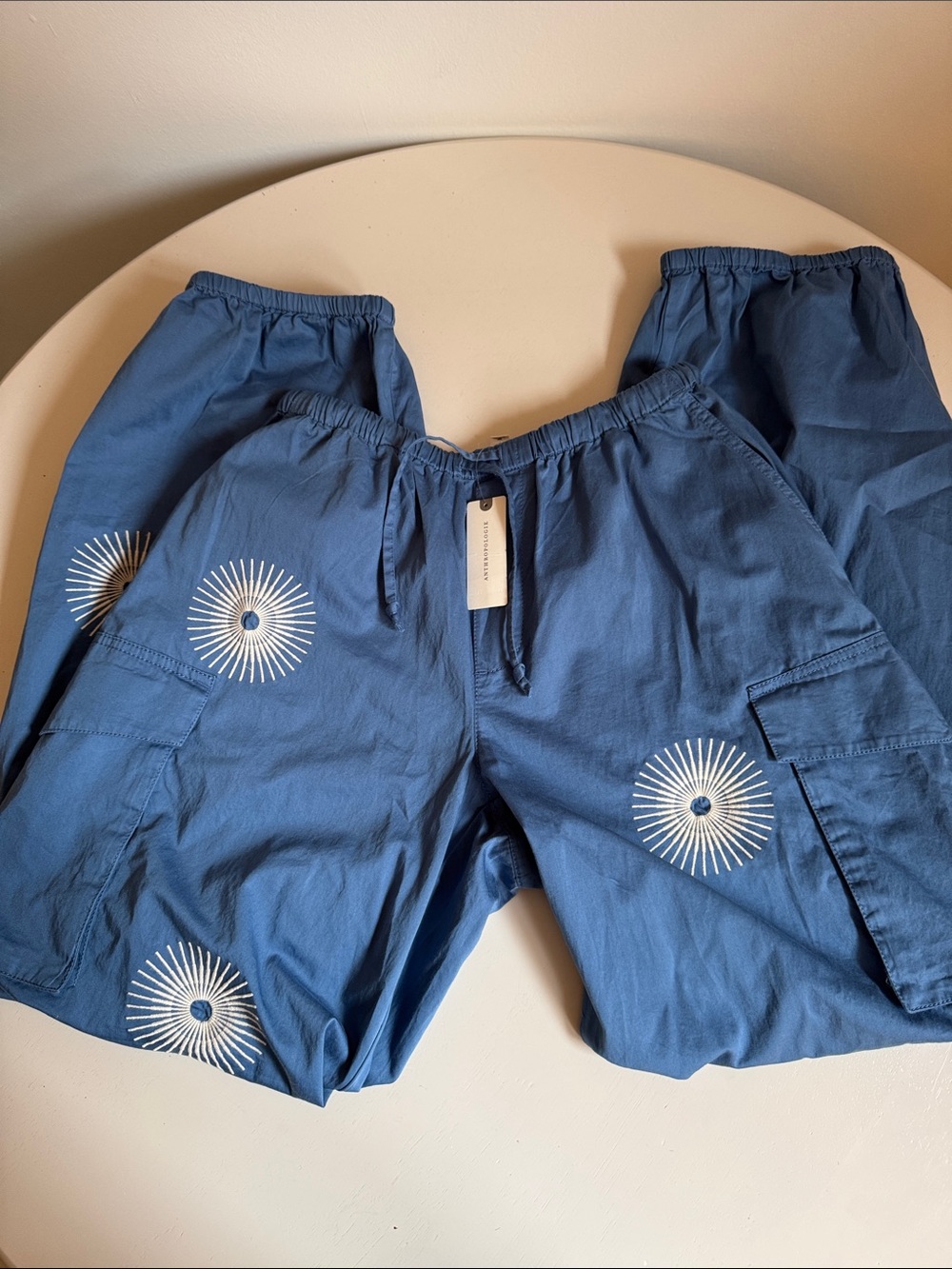 Anthropologie Pilcro Blue Cargo Pants with White Sunburst Embroidery NWT